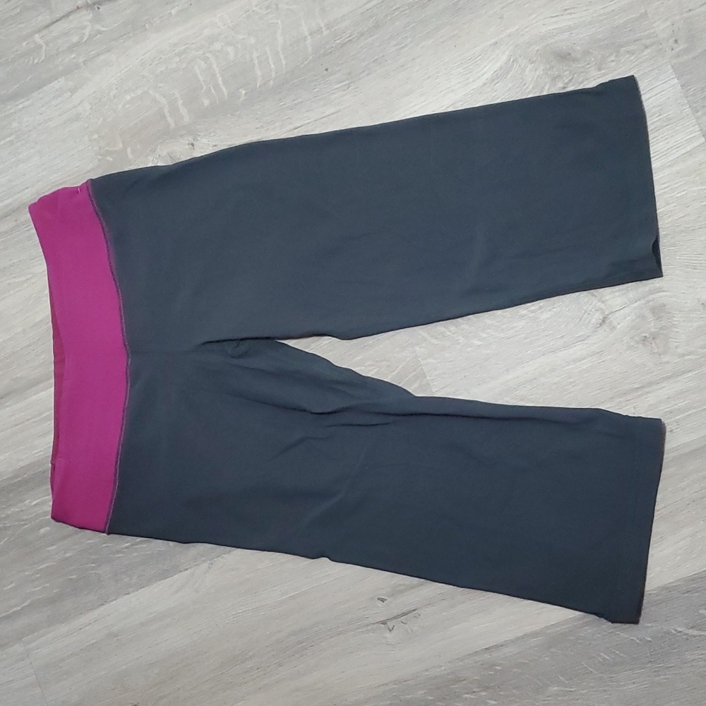 Lululemon black capris with purple waistband
